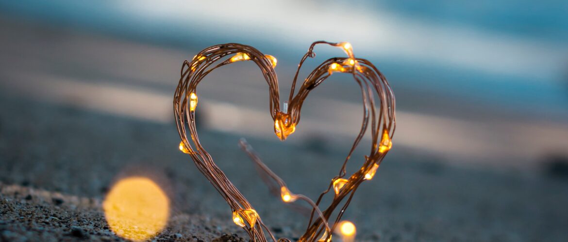 heart made of lights on the sand representing a positive sexual identity