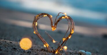 heart made of lights on the sand representing a positive sexual identity