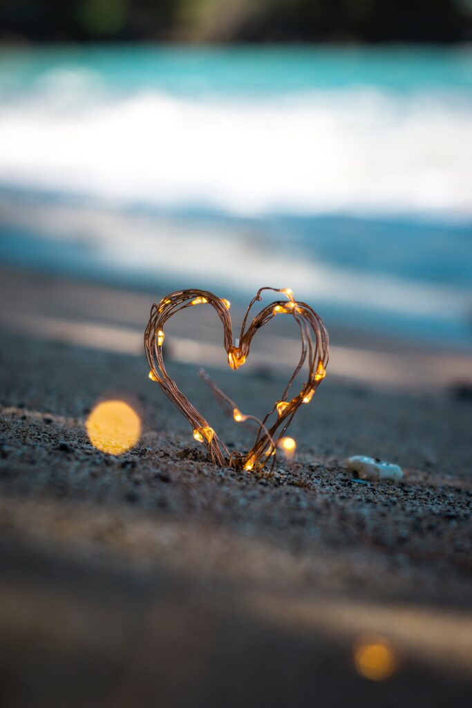 heart made of lights on the sand representing a positive sexual identity