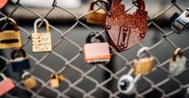 Padlocks on a fence, resentment affecting sex after kids, relationship issues.