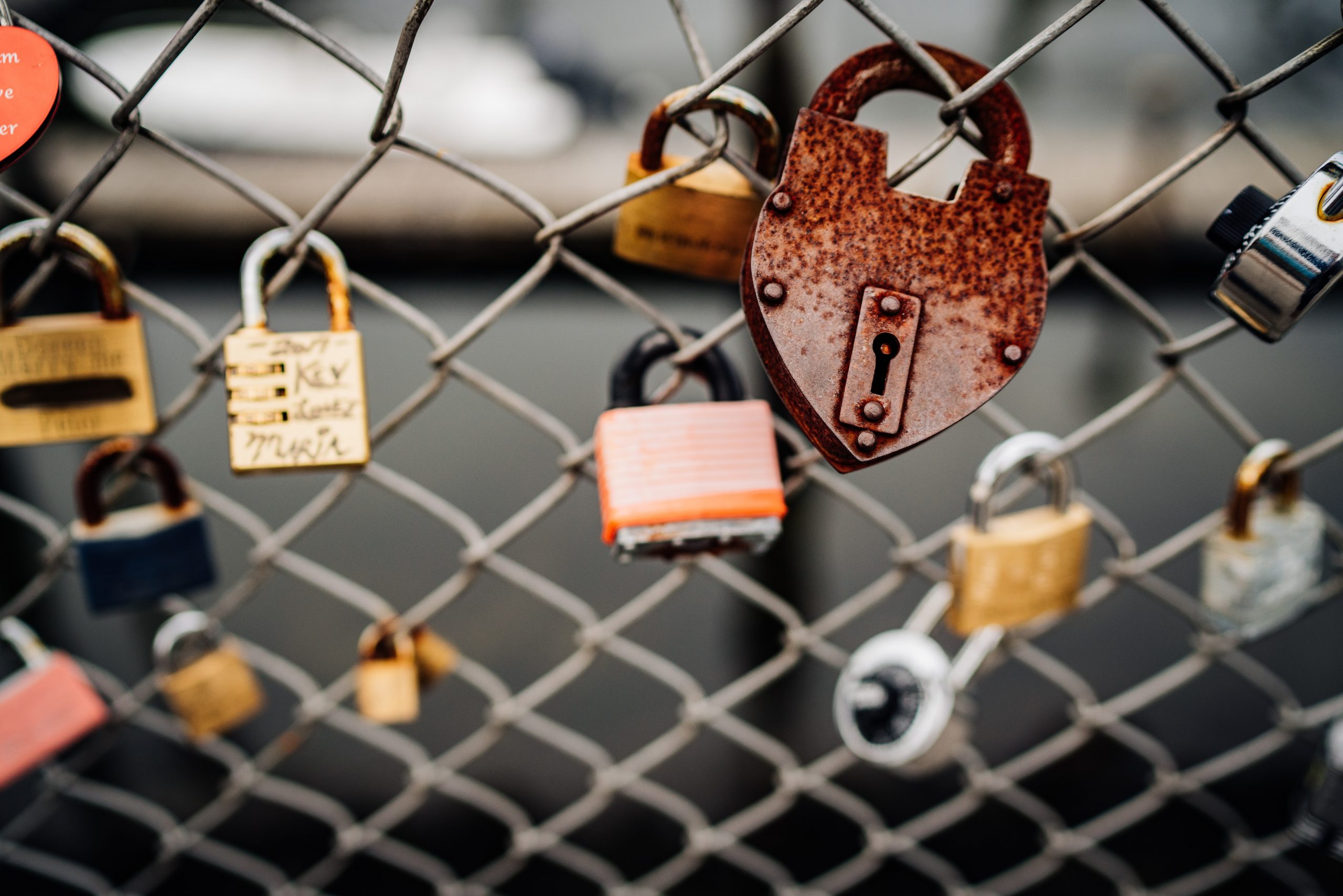 Padlocks on a fence, resentment affecting sex after kids, relationship issues.